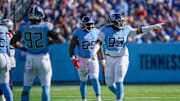 Tennessee Titans defensive tackle T'Vondre Sweat (93) celebrates sacking New England Patriots quarterback Drake Maye (10) during the fourth quarter at Nissan Stadium in Nashville, Tenn., Sunday, Oct. 19, 2025.