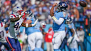 Tennessee Titans quarterback Cam Ward (1) fumbles the ball during the third quarter against the New England Patriots at Nissan Stadium in Nashville, Tenn., Sunday, Oct. 19, 2025.