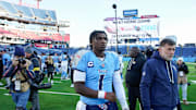 Tennessee Titans quarterback Cam Ward (1) leaves the field after the loss against the Jacksonville Jaguars at Nissan Stadium in Nashville, Tenn., Sunday, Nov. 30, 2025.