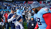 Colton Ehrhardt, 9, meets Tennessee Titans defensive tackle Jeffery Simmons (98) before the game against the Jacksonville Jaguars at Nissan Stadium in Nashville, Tenn., Sunday, Nov. 30, 2025.