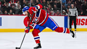 Dec 5, 2024; Montreal, Quebec, CAN; Montreal Canadiens defenseman David Savard (58) shoots the puck against the Nashville Predators during the second period at Bell Centre. Mandatory Credit: David Kirouac-Imagn Images