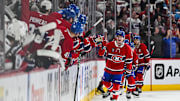 Apr 27, 2025; Montreal, Quebec, CAN; Montreal Canadiens right wing Cole Caufield (13) celebrates with his teammates at the bench his goal against the Washington Capitals during the second period in game four of the first round of the 2025 Stanley Cup Playoffs at Bell Centre. Mandatory Credit: David Kirouac-Imagn Images