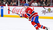 Apr 1, 2023; Montreal, Quebec, CAN; Montreal Canadiens center Sean Farrell (57) skates towards the play against the Carolina Hurricanes during the second period at Bell Centre. Mandatory Credit: David Kirouac-Imagn Images