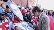 Oct 16, 2025; Newark, New Jersey, USA; New Jersey Devils center Jack Hughes (86) signs an autograph for a fan before the start of the Devils home opener against the Florida Panthers at Prudential Center. Mandatory Credit: Ed Mulholland-Imagn Images