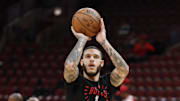 Oct 16, 2024; Chicago, Illinois, USA; Chicago Bulls guard Lonzo Ball (2) warms up before a NBA game against the Minnesota Timberwolves at United Center. Mandatory Credit: Kamil Krzaczynski-Imagn Images