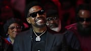 Jan 19, 2024; Miami, Florida, USA; Former Miami Heat player Udonis Haslem sits on the court for his jersey retirement ceremony during halftime of the game between the Miami Heat and the Atlanta Hawks Kaseya Center. Mandatory Credit: Jasen Vinlove-Imagn Images