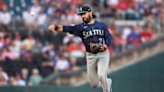 Sep 5, 2025; Atlanta, Georgia, USA; Seattle Mariners third baseman Eugenio Suarez (28) throws a runner out at first against the Atlanta Braves in the second inning at Truist Park. Mandatory Credit: Brett Davis-Imagn Images