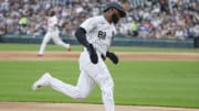 Jun 25, 2024; Chicago, Illinois, USA; Chicago White Sox outfielder Luis Robert Jr. (88) runs to score against the Los Angeles Dodgers during the first inning at Guaranteed Rate Field. Mandatory Credit: Kamil Krzaczynski-USA TODAY Sports
