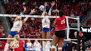 Louisville's Reese Robins (25) spiked the ball for a kill as the No. 3 Louisville Cardinals women's volleyball team faced off against the No. 1 Pitt Panthers on Wednesday, Nov. 27, 2024.