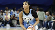 May 25, 2024; Chicago, Illinois, USA; Chicago Sky forward Angel Reese (5) looks to shoot against the Connecticut Sun during the second half of a WNBA game at Wintrust Arena.