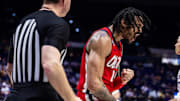 Feb 8, 2025; Baton Rouge, Louisiana, USA;  Mississippi Rebels guard Dre Davis (14) reacts to a play during the second half against the LSU Tigers at Pete Maravich Assembly Center. Mandatory Credit: Stephen Lew-Imagn Images
