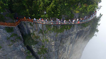 Glass Skywalk Overlooking Road Of 99 Turns 0pens In Zhangjiajie