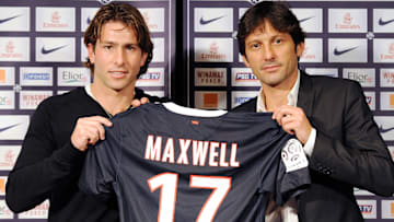 Maxwell on his presentation day with sporting director Leonardo in 2012