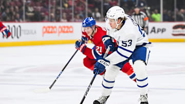 Sep 30, 2023; Montreal, Quebec, CAN; Toronto Maple Leafs right wing Easton Cowan (53) plays the puck against the Montreal Canadiens during the first period at Bell Centre. Mandatory Credit: David Kirouac-Imagn Images