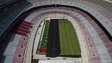 Jul 30, 2024; Columbus, Ohio, USA; Sheets of sod grass are put down over the artificial turf inside Ohio Stadium in preparation for this weekend's Manchester City - Chelsea FC English Premier League exhibition soccer match.