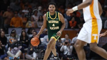 Dec 5, 2023; Knoxville, Tennessee, USA; George Mason Patriots guard Keyshawn Hall (4) brings the ball up court against the Tennessee Volunteers during the first half at Thompson-Boling Arena at Food City Center. Mandatory Credit: Randy Sartin-USA TODAY Sports