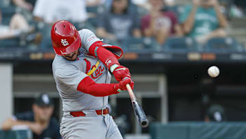 Jun 19, 2025; Chicago, Illinois, USA; St. Louis Cardinals third baseman Nolan Arenado (28) hits a solo home run against the Chicago White Sox during the third inning of game two of a doubleheader at Rate Field. Mandatory Credit: Kamil Krzaczynski-Imagn Images