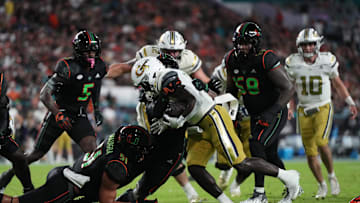 Oct 7, 2023; Miami Gardens, Florida, USA; Georgia Tech Yellow Jackets running back Jamal Haynes (11) runs the ball for a touchdown against the Miami Hurricanes in the second half at Hard Rock Stadium. Mandatory Credit: Jasen Vinlove-Imagn Images