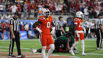 Dec 28, 2024; Orlando, FL, USA; Miami Hurricanes defensive back Mishael Powell (0) reacts during the second half against the Iowa State Cyclones at Camping World Stadium. Mandatory Credit: Jasen Vinlove-Imagn Images