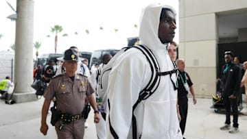 Dec 28, 2024; Orlando, FL, USA; Miami Hurricanes quarterback Cam Ward (1) arrives prior to the game against the Iowa State Cyclones at Camping World Stadium. Mandatory Credit: Jasen Vinlove-Imagn Images