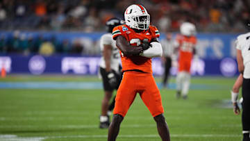 Dec 28, 2024; Orlando, FL, USA; Miami Hurricanes linebacker Wesley Bissainthe (31) reacts after tackling Iowa State Cyclones quarterback Rocco Becht (3, not pictured) during the second half at Camping World Stadium. Mandatory Credit: Jasen Vinlove-Imagn Images