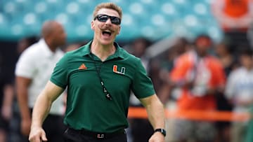 Sep 24, 2022; Miami Gardens, Florida, USA; Miami Hurricanes strength coach Aaron Feld reacts on the field prior to the game between the Miami Hurricanes and the Middle Tennessee Blue Raiders at Hard Rock Stadium. Mandatory Credit: Jasen Vinlove-Imagn Images