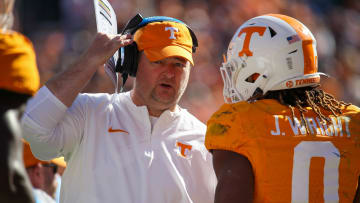Nov 4, 2023; Knoxville, Tennessee, USA; Tennessee Volunteers head coach Josh Heupel speaks with running back Jaylen Wright (0) during the first half against the Connecticut Huskies at Neyland Stadium. Mandatory Credit: Randy Sartin-USA TODAY Sports