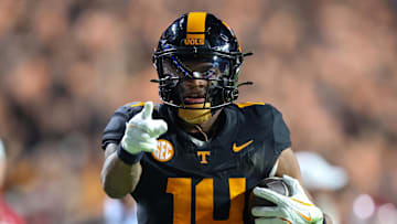 Nov 1, 2025; Knoxville, Tennessee, USA; Tennessee Volunteers wide receiver Braylon Staley (14) runs for a touchdown against the Oklahoma Sooners during the second half at Neyland Stadium. Mandatory Credit: Randy Sartin-Imagn Images