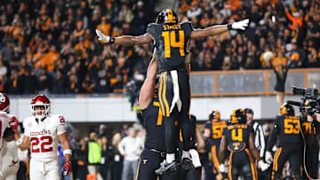 Nov 1, 2025; Knoxville, Tennessee, USA; Tennessee Volunteers wide receiver Braylon Staley (14) and offensive lineman Jesse Perry (72) celebrate a touchdown against the Oklahoma Sooners during the first quarter at Neyland Stadium. Mandatory Credit: Randy Sartin-Imagn Images