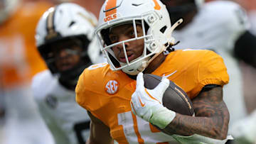 Nov 29, 2025; Knoxville, Tennessee, USA;  Tennessee Volunteers running back Desean Bishop (18) runs for a touchdown against the Vanderbilt Commodores during the first half against at Neyland Stadium. Mandatory Credit: Randy Sartin-Imagn Images