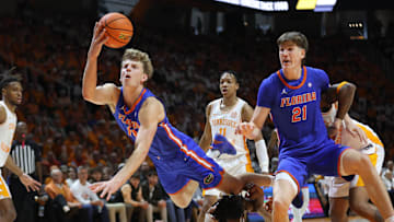 Feb 1, 2025; Knoxville, Tennessee, USA; Florida Gators forward Thomas Haugh (10) tries to keep a ball inbounds during the second half against the Tennessee Volunteers at Thompson-Boling Arena at Food City Center. Mandatory Credit: Randy Sartin-Imagn Images
