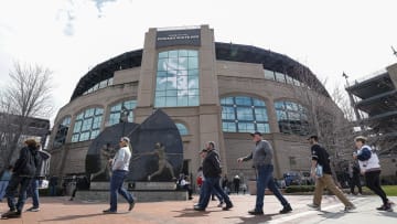 Fans arrive at Guaranteed Rate Field before an Opening Day game