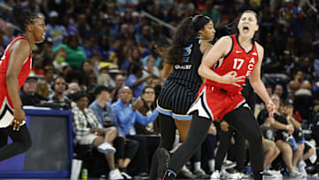 Aug 25, 2024; Chicago, Illinois, USA; Las Vegas Aces center Megan Gustafson (17) celebrates after scoring against the Chicago Sky during the second half at Wintrust Arena. Mandatory Credit: Kamil Krzaczynski-Imagn Images