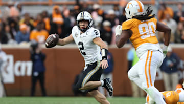 Nov 29, 2025; Knoxville, Tennessee, USA;  Vanderbilt Commodores quarterback Diego Pavia (2) scrambles with against the Tennessee Volunteers during the first half at Neyland Stadium. Mandatory Credit: Randy Sartin-Imagn Images