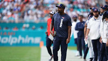 Nov 24, 2024; Miami Gardens, Florida, USA; New England Patriots head coach Jerod Mayo walks down the sideline during the first half against the Miami Dolphins at Hard Rock Stadium. Mandatory Credit: Jasen Vinlove-Imagn Images