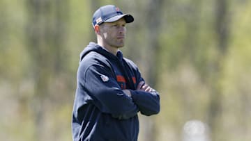 May 9, 2025; Lake Forest, IL, USA; Chicago Bears head coach Ben Johnson (R) looks on during the Rookie Minicamp at Halas Hall. Mandatory Credit: Kamil Krzaczynski-Imagn Images