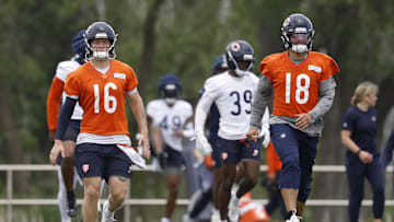 Jun 3, 2025; Lake Forest, IL, USA; Chicago Bears quarterback Austin Reed (16) and quarterback Caleb Williams (18) warm up during minicamp at Halas Hall. Mandatory Credit: Kamil Krzaczynski-Imagn Images
