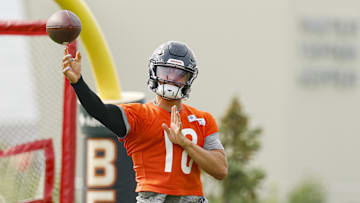Jul 24, 2025; Lake Forest, IL, USA; Chicago Bears quarterback Caleb Williams (18) passes the ball during training camp at Halas Hall. Mandatory Credit: Kamil Krzaczynski-Imagn Images
