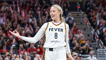 Jul 9, 2025; Indianapolis, Indiana, USA; Indiana Fever guard Sophie Cunningham (8) celebrates a made basket in the first half against Golden State Valkyries  at Gainbridge Fieldhouse. Mandatory Credit: Trevor Ruszkowski-Imagn Images