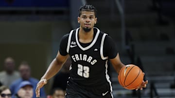 Dec 10, 2024; Chicago, Illinois, USA; St. John's basketball transfer commit forward Bryce Hopkins (23) brings the ball up court against the DePaul Blue Demons during the second half at Wintrust Arena.