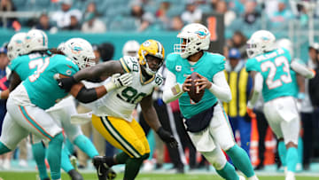 Dec 25, 2022; Miami Gardens, Florida, USA; Miami Dolphins quarterback Tua Tagovailoa (1) drops back before attempting a pass against the Green Bay Packers during the first half at Hard Rock Stadium. Mandatory Credit: Jasen Vinlove-Imagn Images