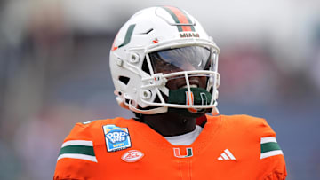 Dec 28, 2024; Orlando, FL, USA; Miami Hurricanes quarterback Cam Ward (1) warms up prior to the game against the Iowa State Cyclones at Camping World Stadium. Mandatory Credit: Jasen Vinlove-Imagn Images