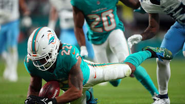 Dec 11, 2023; Miami Gardens, Florida, USA; Miami Dolphins safety Elijah Campbell (22) recovers the ball after it was fumbled by the Tennessee Titans' punt return team last season.
