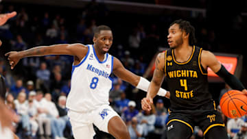 Memphis' David Jones (8) guards Wichita State's Colby Rogers (4) during the game between Wichita State and University of Memphis at FedExForum in Memphis, Tenn., on Saturday, February 3, 2024.