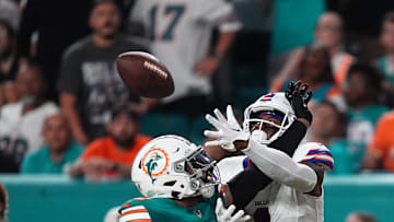 Miami Dolphins linebacker Jordyn Brooks (20) breaks up the pass to Buffalo Bills wide receiver Curtis Samuel (1) during the first half at Hard Rock Stadium in Week 2.