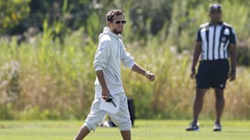 Miami Dolphins head coach Mike McDaniel walks on the field during joint training camp practice with the Chicago Bears ahead of the preseason opener.
