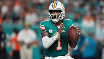 Sep 12, 2024; Miami Gardens, Florida, USA; Miami Dolphins quarterback Tua Tagovailoa (1) drops back with the ball against the Buffalo Bills during the first half at Hard Rock Stadium. Mandatory Credit: Jasen Vinlove-Imagn Images