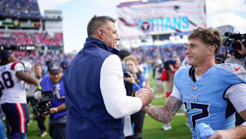 New England Patriots coach Mike Vrabel shakes hands with Tennessee Titans wide receiver Mason Kinsey (12) after the game at Nissan Stadium in Nashville, Tenn., Sunday, Oct. 19, 2025.