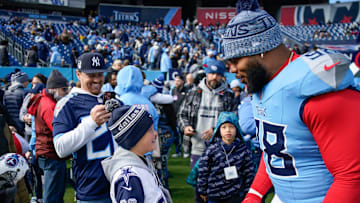 Colton Ehrhardt, 9, meets Tennessee Titans defensive tackle Jeffery Simmons (98) before the game against the Jacksonville Jaguars at Nissan Stadium in Nashville, Tenn., Sunday, Nov. 30, 2025.