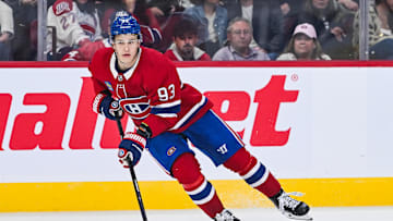 Sep 25, 2025; Montreal, Quebec, CAN; Montreal Canadiens right wing Ivan Demidov (93) plays the puck against the Toronto Maple Leafs during the third period at Bell Centre. Mandatory Credit: David Kirouac-Imagn Images